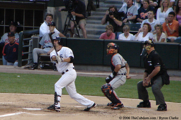 Paul Konerko drives one to left field