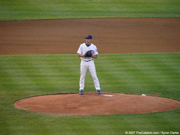 Rich Hill throws a pitch